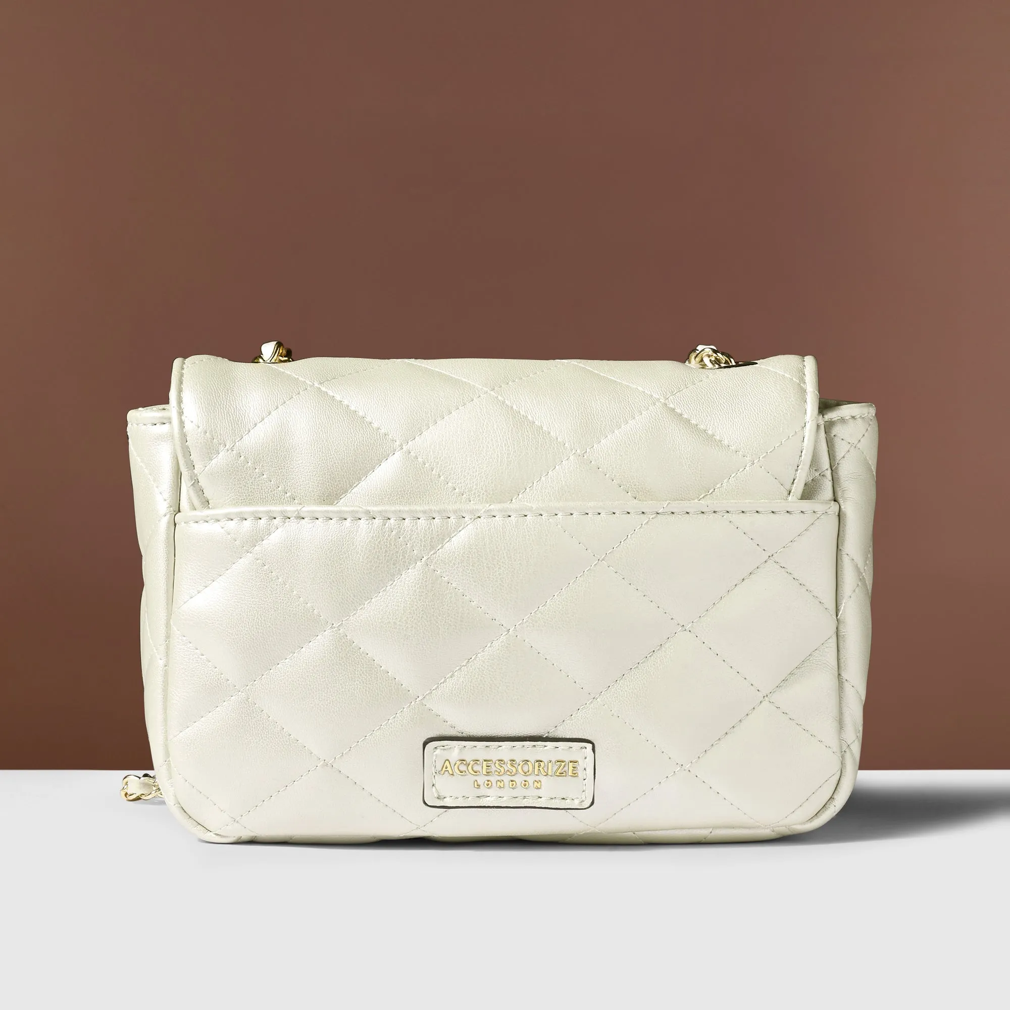 Accessorize London Women's White Quilted Twistlock Sling Bag