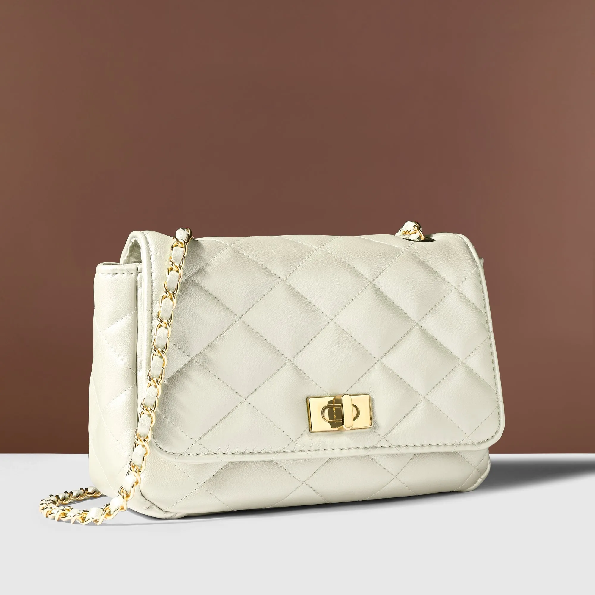 Accessorize London Women's White Quilted Twistlock Sling Bag