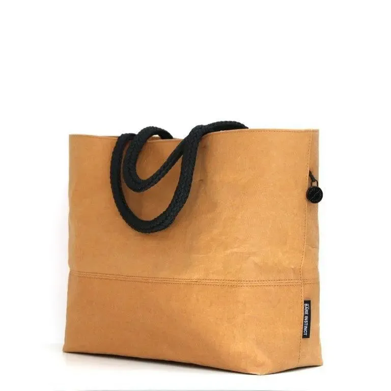 Tan vegan washable paper bag by Bare Instinct